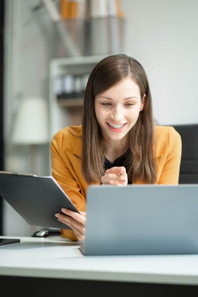 Business woman using digital tablet with calendar planner and organizer to plan and reminder