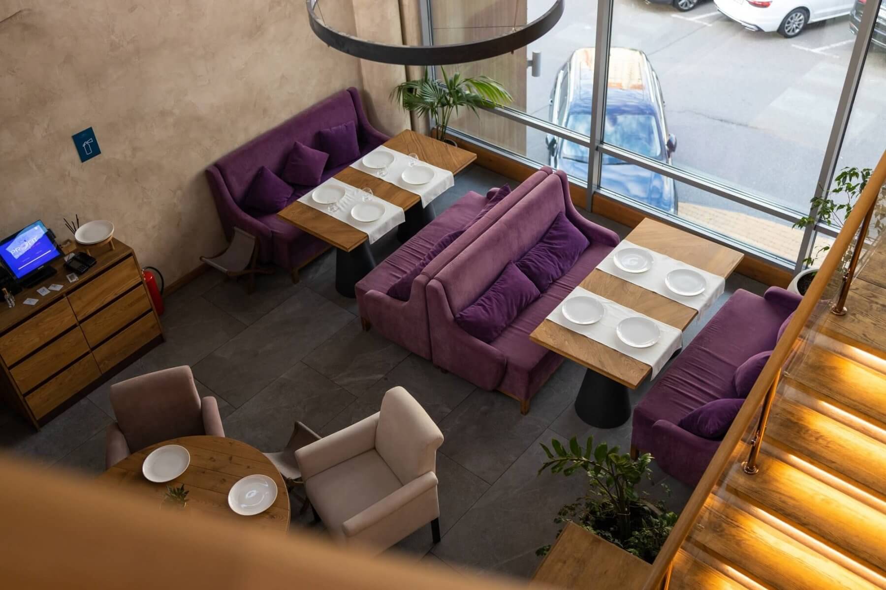 Beautifully organized event - round served table banquet ready for guests, round decorated table wit